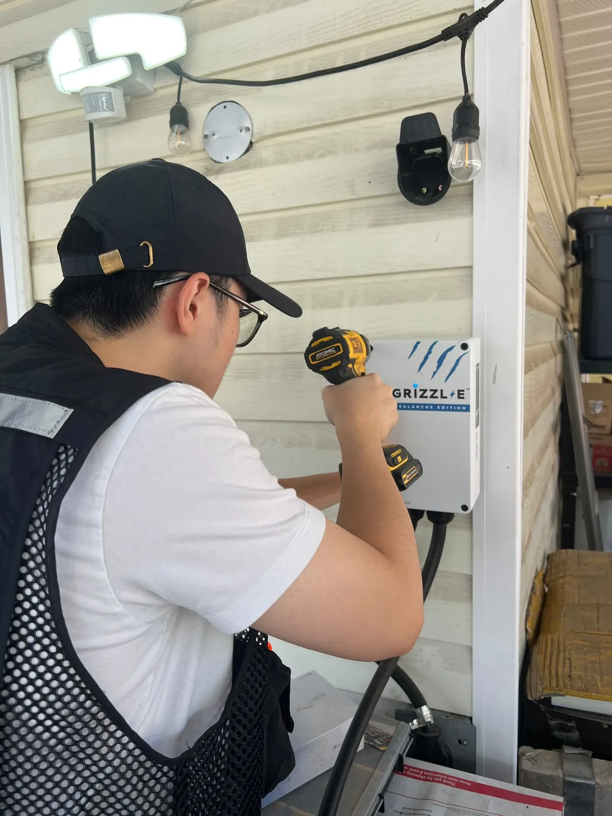 Technician working on the Grizzl-E charger